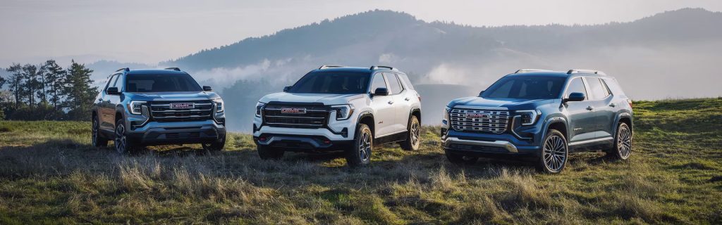 2026 GMC Terrain Denali trim parked outside showcasing premium styling, signature grille, and refined SUV design.