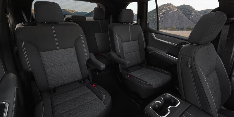 2026 GMC Acadia interior seating with three-row passenger cabin